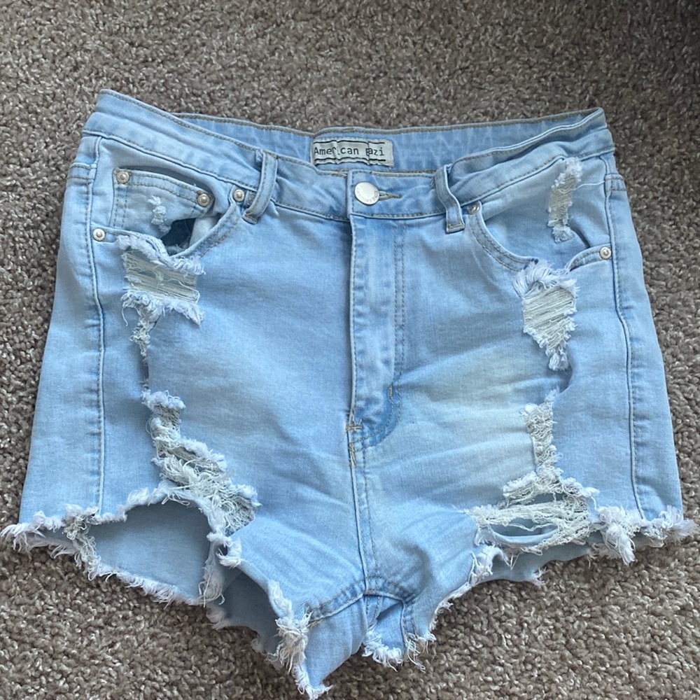Light blue ripped jean shorts